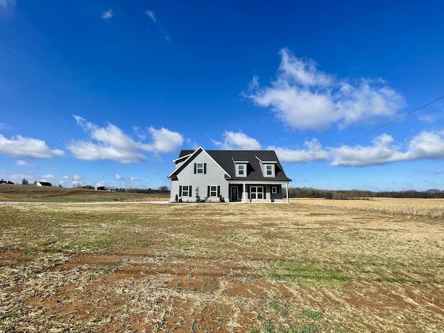 view of front of home featuring a rural view