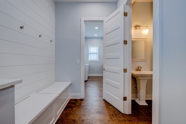 mudroom featuring dark wood-type flooring