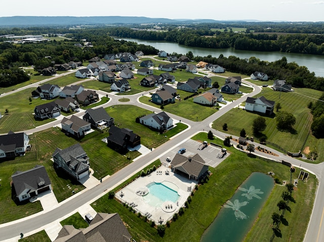 bird's eye view with a water view