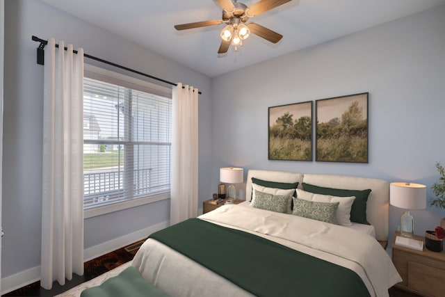 bedroom featuring dark hardwood / wood-style floors and ceiling fan