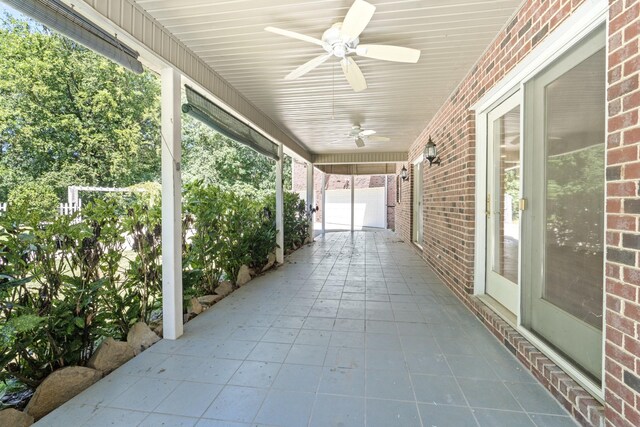 view of patio featuring ceiling fan