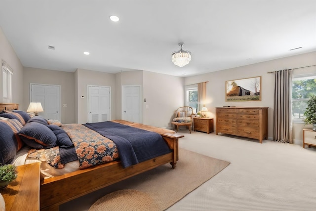 bedroom with recessed lighting, visible vents, and carpet flooring