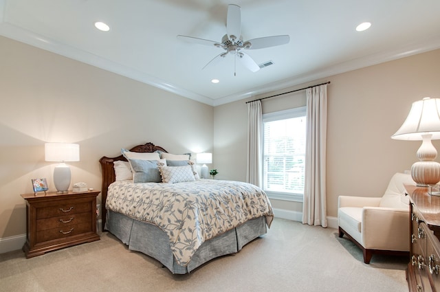 bedroom with ceiling fan, light colored carpet, and crown molding