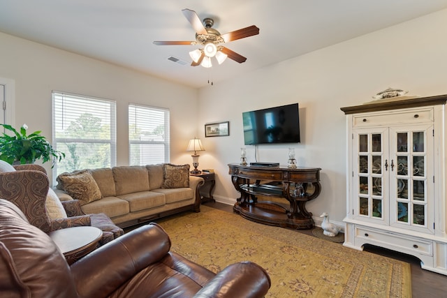 living room featuring ceiling fan