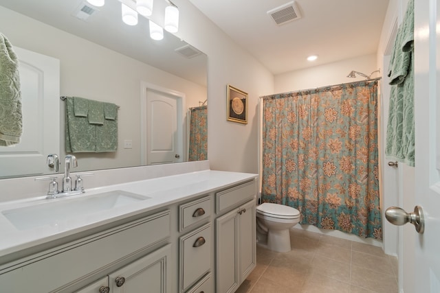 bathroom featuring tile patterned flooring, vanity, toilet, and a shower with curtain