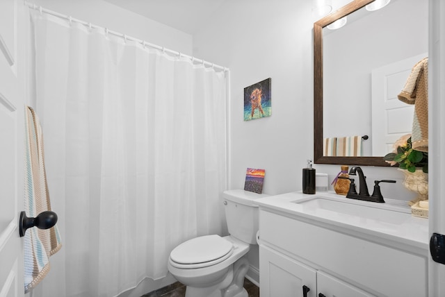 bathroom with vanity, toilet, and a shower with shower curtain