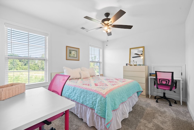 carpeted bedroom with ceiling fan