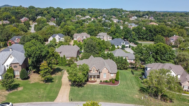 birds eye view of property with a residential view