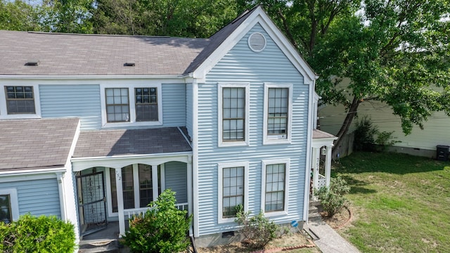 view of front facade featuring a front yard