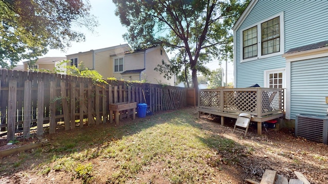 view of yard with central AC unit