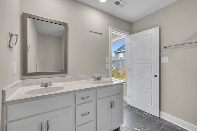 bathroom featuring vanity