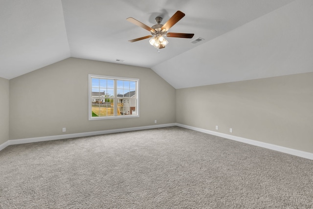 bonus room featuring ceiling fan, carpet, and vaulted ceiling