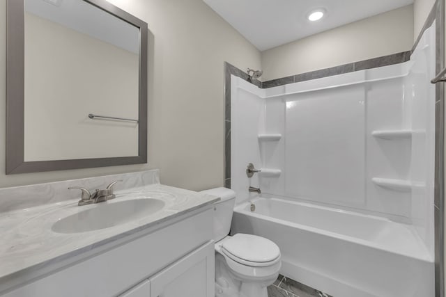 full bathroom with shower / bathing tub combination, vanity, and toilet