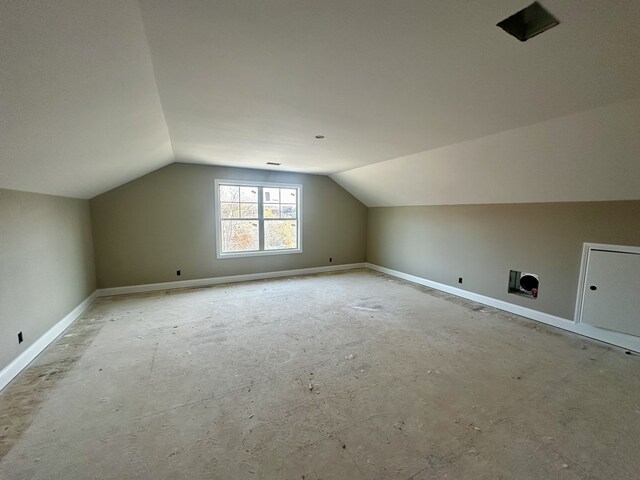 bonus room featuring vaulted ceiling