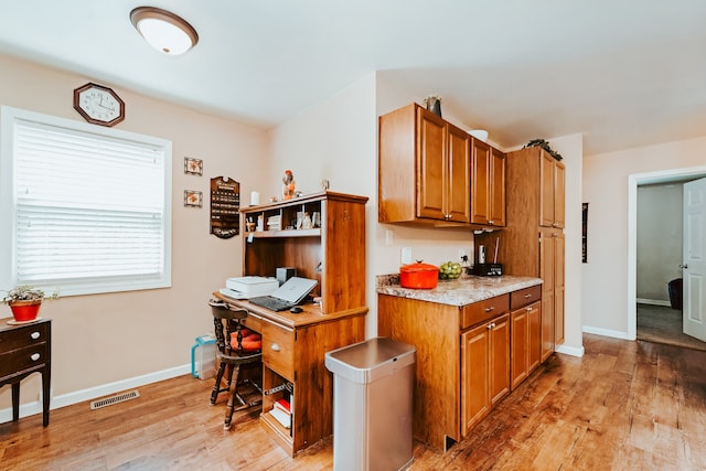 kitchen featuring light wood-type flooring