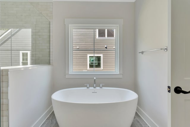 bathroom featuring separate shower and tub