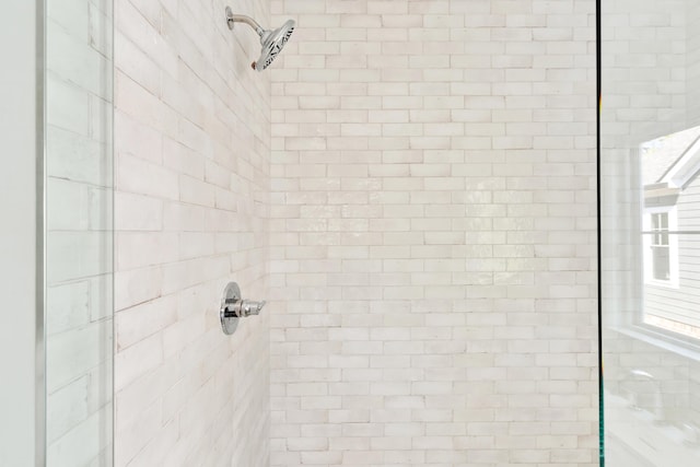 details featuring a tile shower