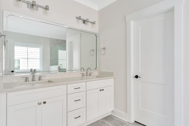 bathroom featuring vanity, hardwood / wood-style flooring, and a shower with shower door