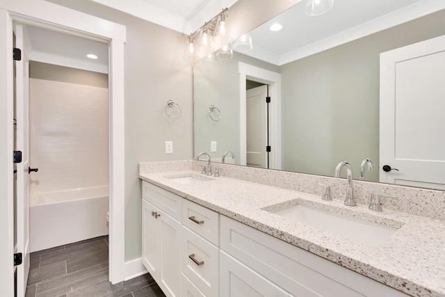 bathroom featuring vanity and shower with separate bathtub