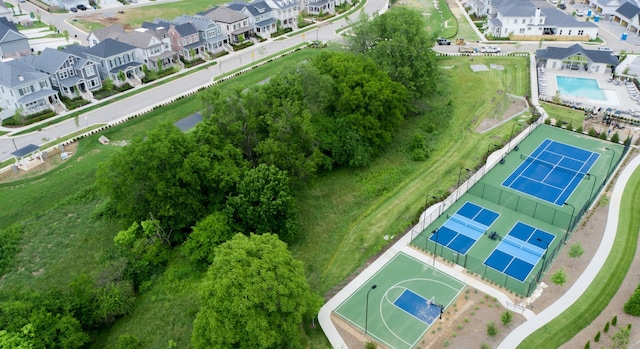 birds eye view of property with a residential view