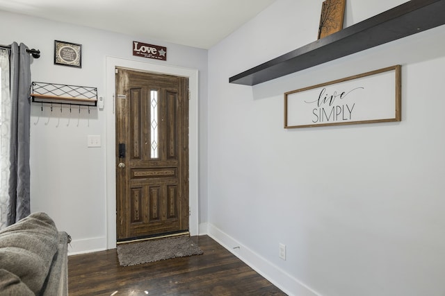 entrance foyer featuring dark hardwood / wood-style floors