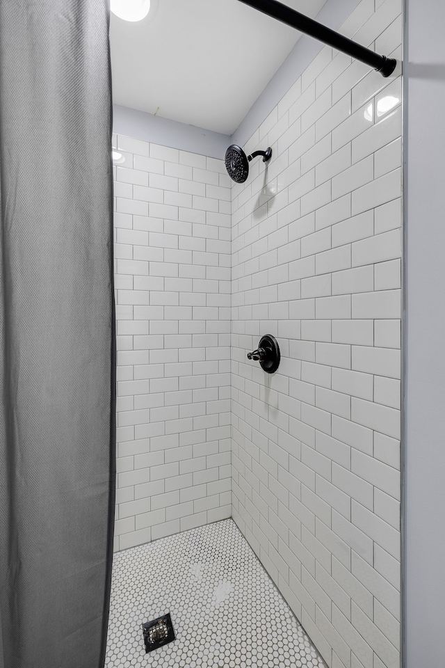 bathroom with a shower with shower curtain