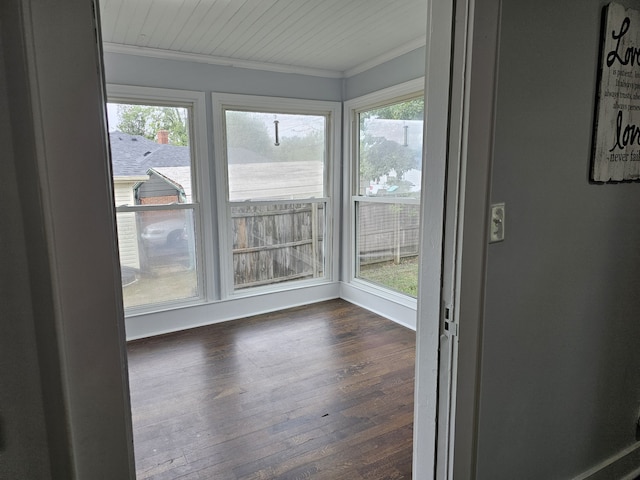 unfurnished sunroom featuring a healthy amount of sunlight