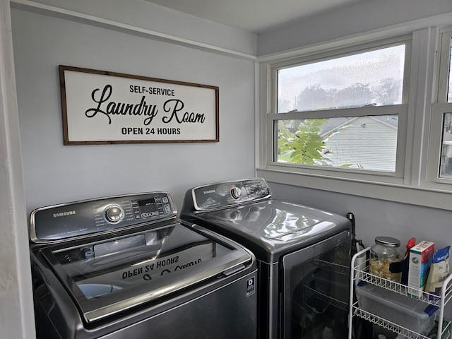 washroom featuring washer and dryer