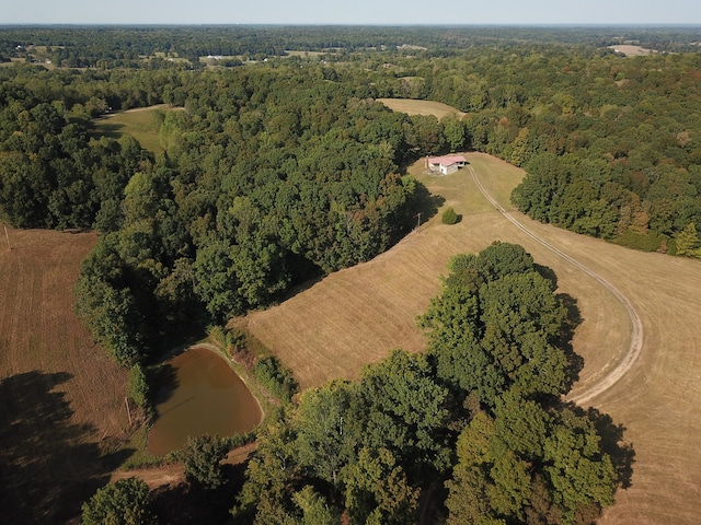 drone / aerial view with a rural view and a water view