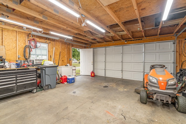 garage with a workshop area