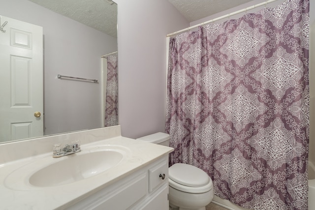 full bathroom with vanity, a textured ceiling, toilet, and shower / bathtub combination with curtain