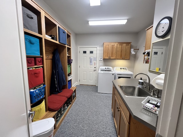 kitchen with washer and dryer and sink