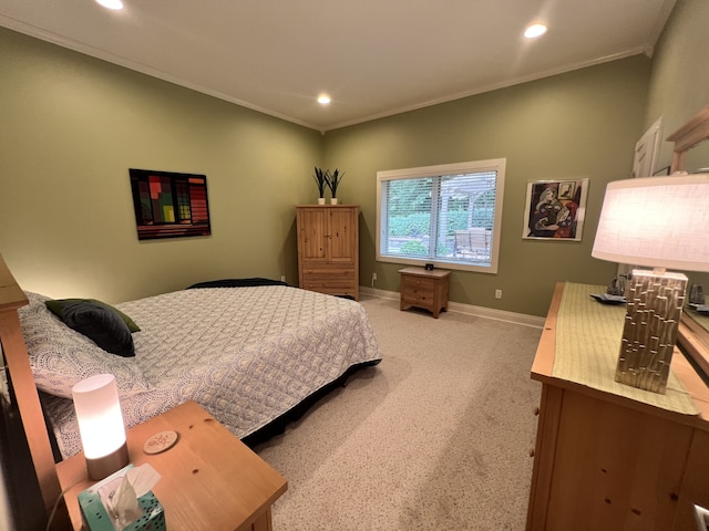 carpeted bedroom featuring ornamental molding