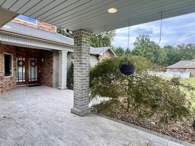 view of patio featuring french doors