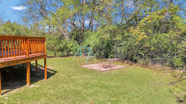 view of yard featuring a wooden deck