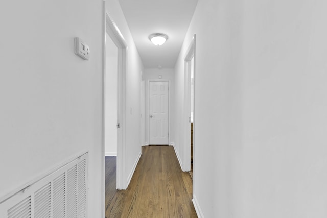 hallway featuring hardwood / wood-style floors