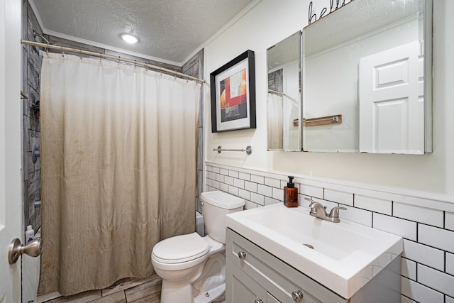 bathroom with vanity, a textured ceiling, hardwood / wood-style flooring, toilet, and decorative backsplash