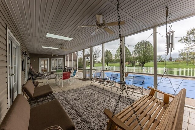 233 Nine Mile Cross Rd W, Pikeville, TN 37367 - sunroom / solarium with ceiling fan and outdoor dining area