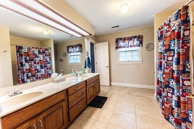 233 Nine Mile Cross Rd W, Pikeville, TN 37367 - full bath featuring a sink, tile patterned floors, plenty of natural light, and visible vents