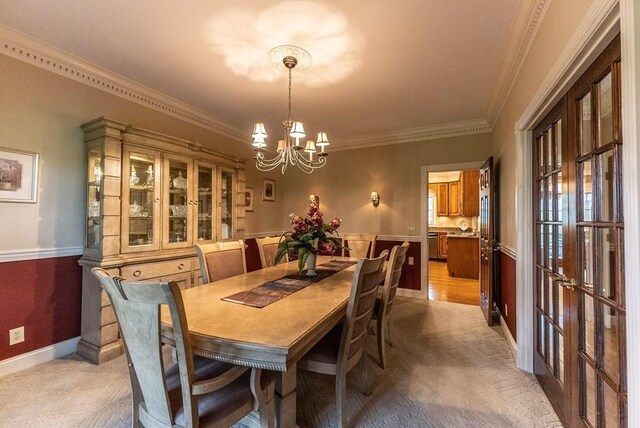 233 Nine Mile Cross Rd W, Pikeville, TN 37367 - dining room featuring crown molding, light colored carpet, baseboards, and an inviting chandelier