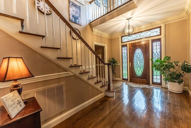 233 Nine Mile Cross Rd W, Pikeville, TN 37367 - foyer featuring stairway, baseboards, wood finished floors, and a towering ceiling
