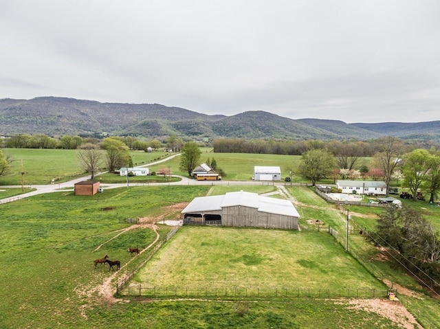 bird's eye view with a mountain view and a rural view