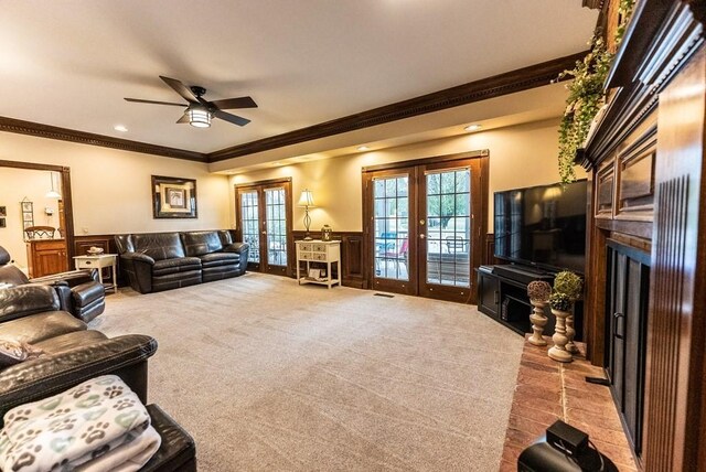 233 Nine Mile Cross Rd W, Pikeville, TN 37367 - living area featuring crown molding, carpet floors, a fireplace, ceiling fan, and french doors