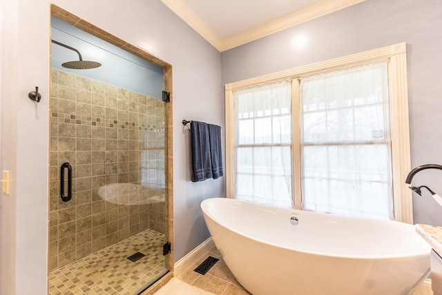 bathroom featuring tile patterned flooring, vanity, independent shower and bath, and crown molding