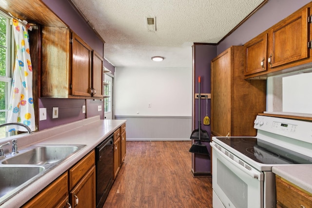 163 Longbranch Rd, Hohenwald, TN 38462 - kitchen featuring white range with electric stovetop, black dishwasher, a sink, dark wood-style floors, and a textured ceiling
