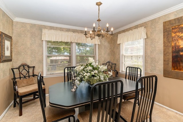 dining area featuring ornamental molding, plenty of natural light, and a chandelier