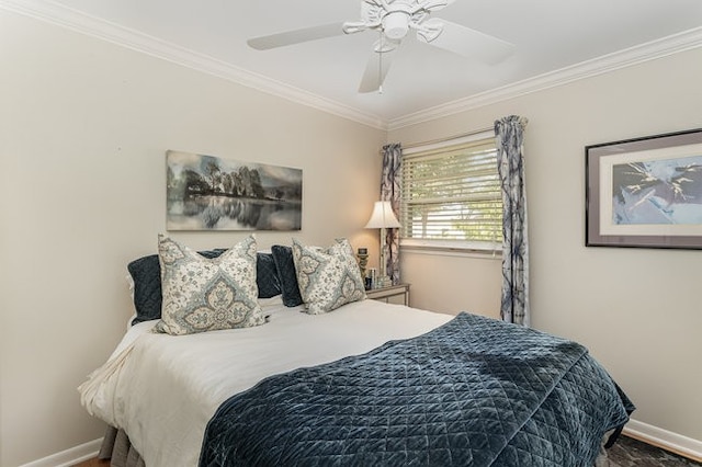 bedroom featuring ornamental molding and ceiling fan