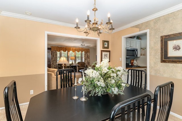 dining space with crown molding and ceiling fan with notable chandelier