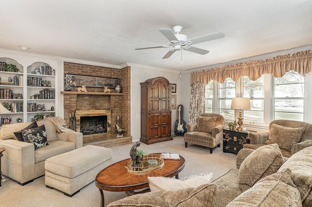 carpeted living room with ceiling fan, a fireplace, and crown molding