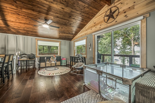 sunroom / solarium featuring vaulted ceiling, ceiling fan, and wooden ceiling